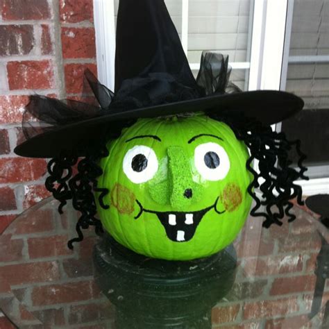 Spook your neighbors with a wicket witch pumpkin display